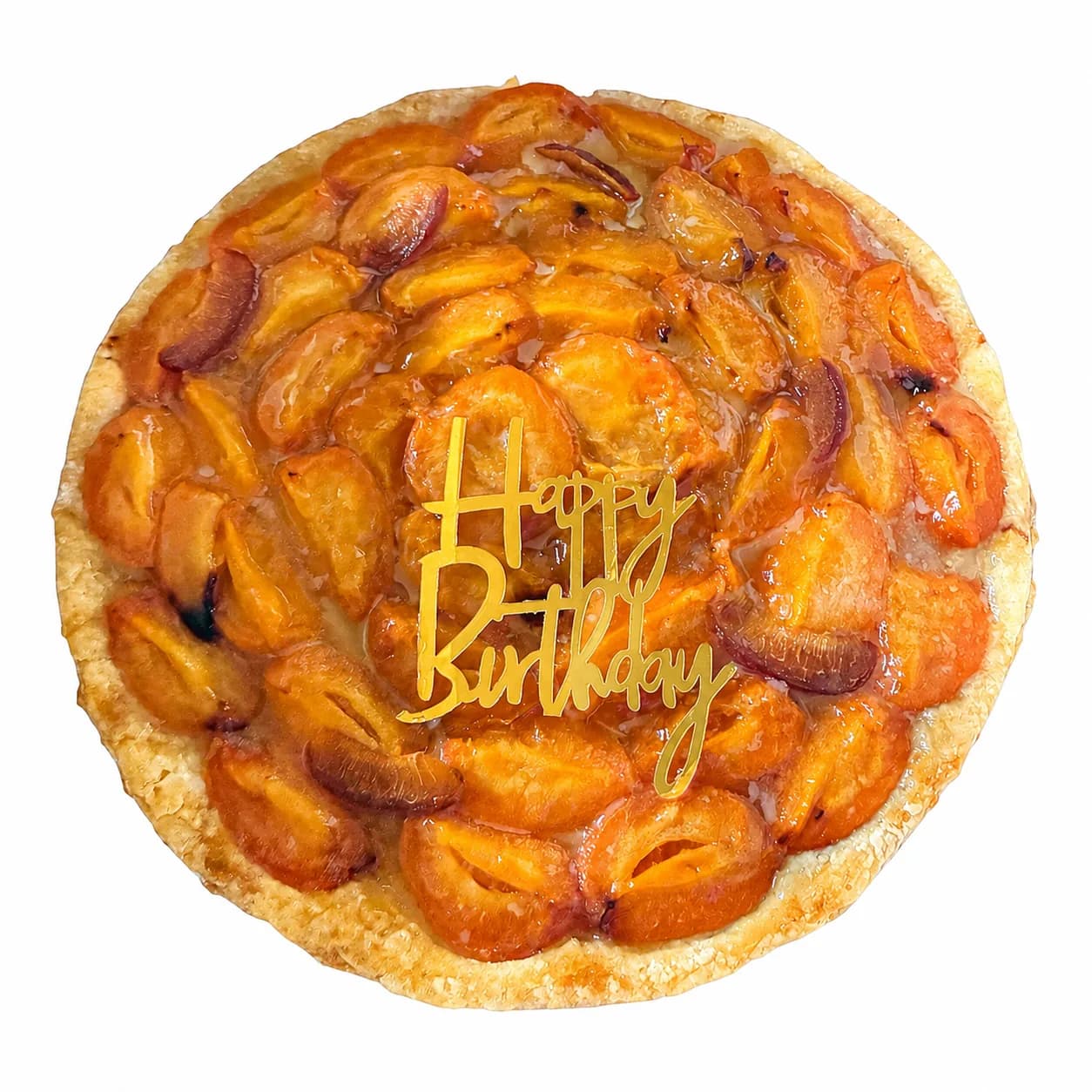 Tarte ronde aux abricots caramélisés, topper doré Happy Birthday